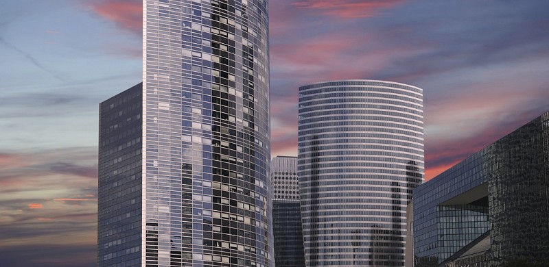 Paříž, moderní budovy v obchodní čtvrti La Défense při západu slunce